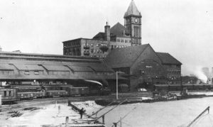 A black and white photo of the exterior of the Central Station in Chicago, c. 1894. H.H. Holmes would have met Nannie's train here.