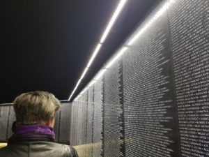 A night time photo of the illuminated Wall That Heals now in Garland. This is as 3/4 scale version of the Vietnam Veterans memorial