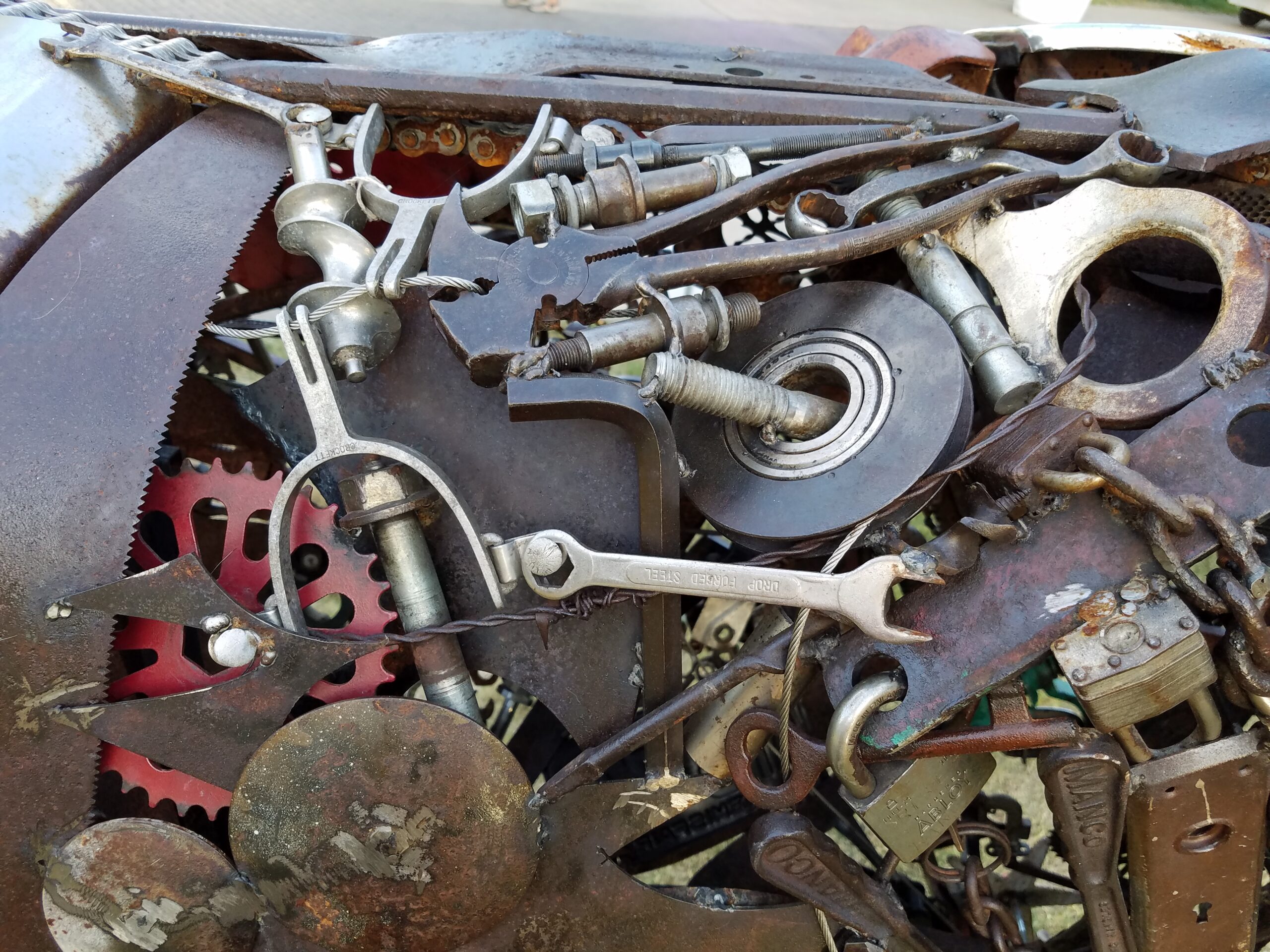 A close up of the side of the steer sculpture is seen here - art.